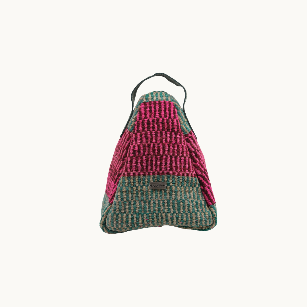 Salabim weighted door stop in magenta over sage green hand-weave with a dark green leather loop, front view #color_Pink and Sage