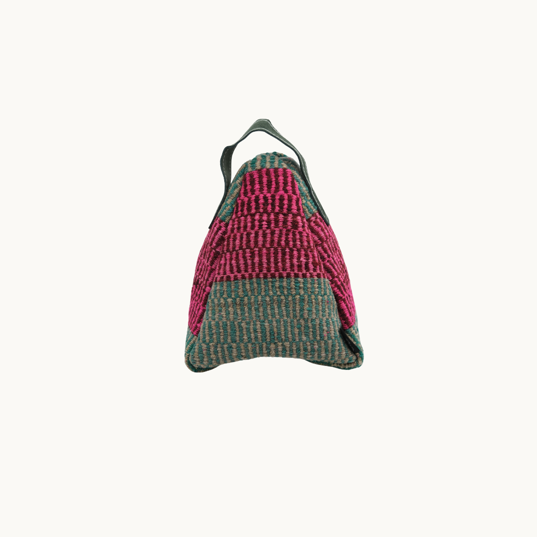 Pink and sage Salabim weighted door stop from the reverse, showing the banded magenta and green weave #color_Pink and Sage