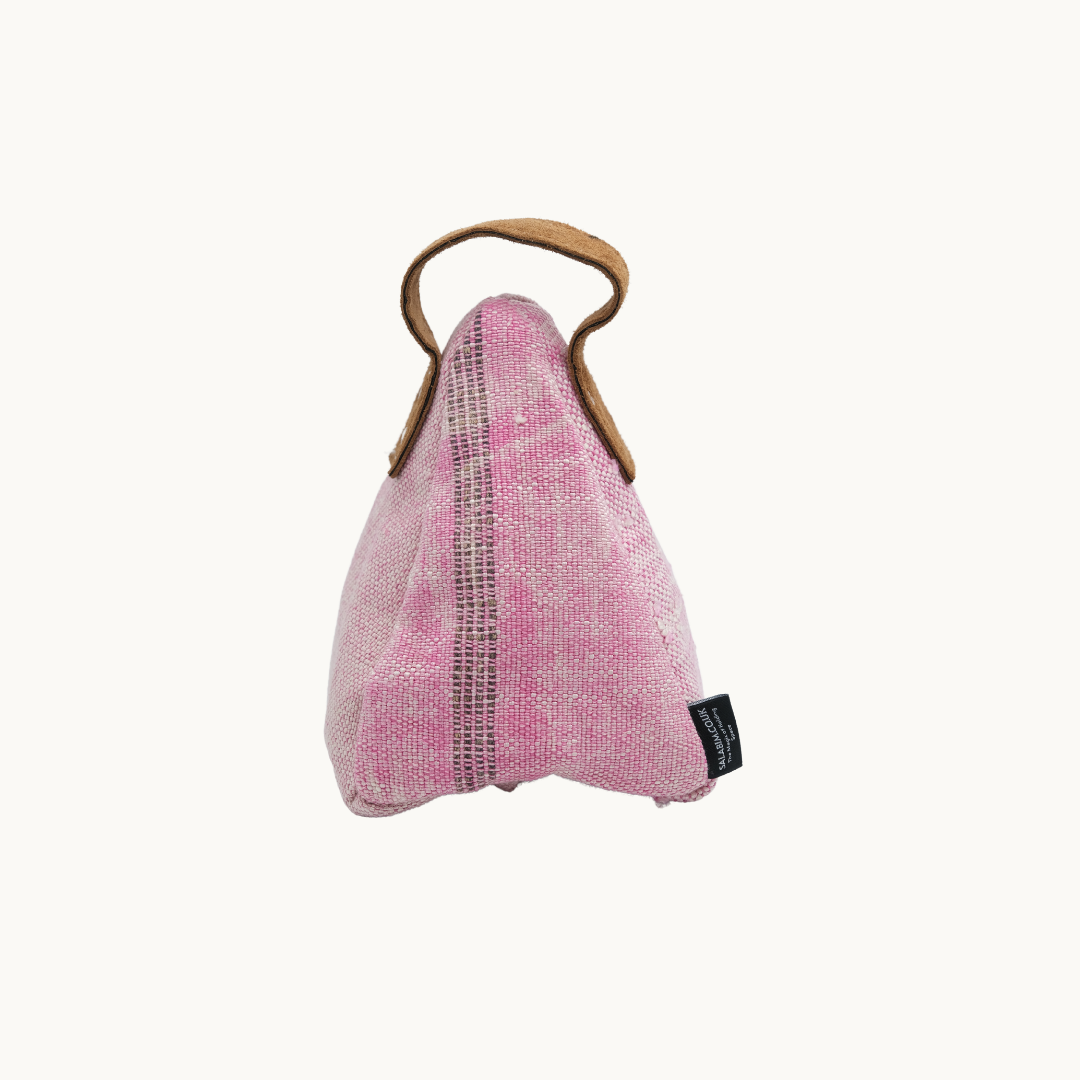 Blush pink Moroccan silk Salabim door stop from the reverse, showing the stitched seam and woven label #color_Blush