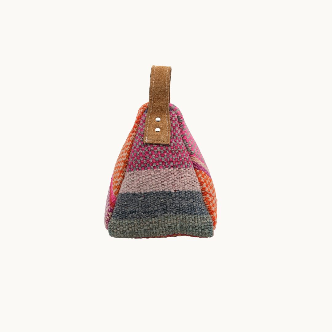 Side profile of the ochre patchwork Salabim door stop, showing the riveted tan leather carry loop #color_Ochre Patchwork