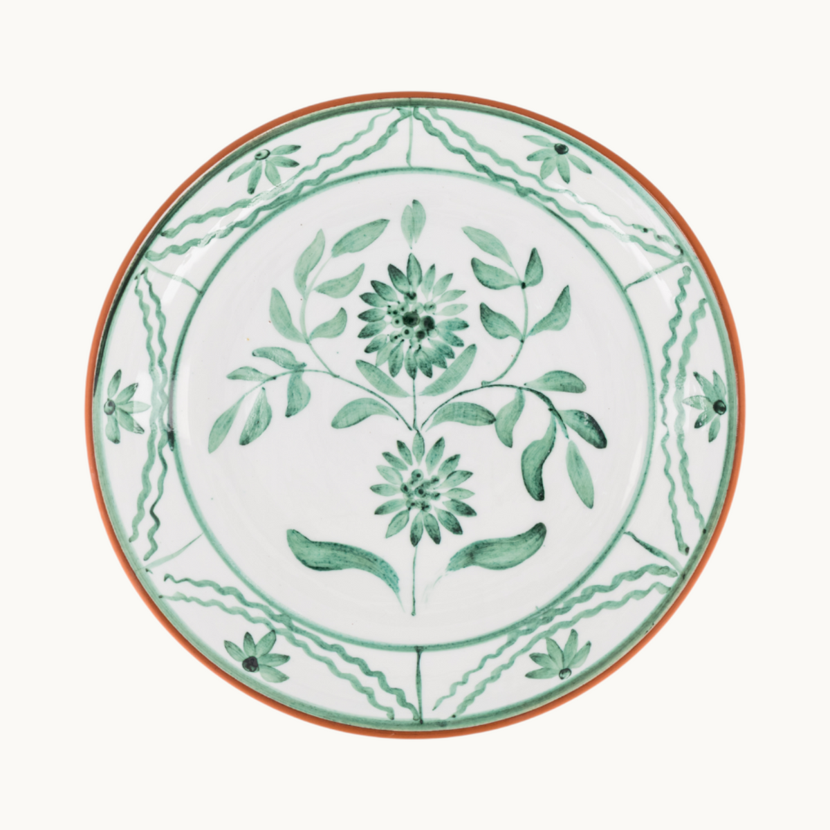MANTRA LIVING hand-painted terracotta Lebrillo platter with a white glazed interior and green botanical floral design.
