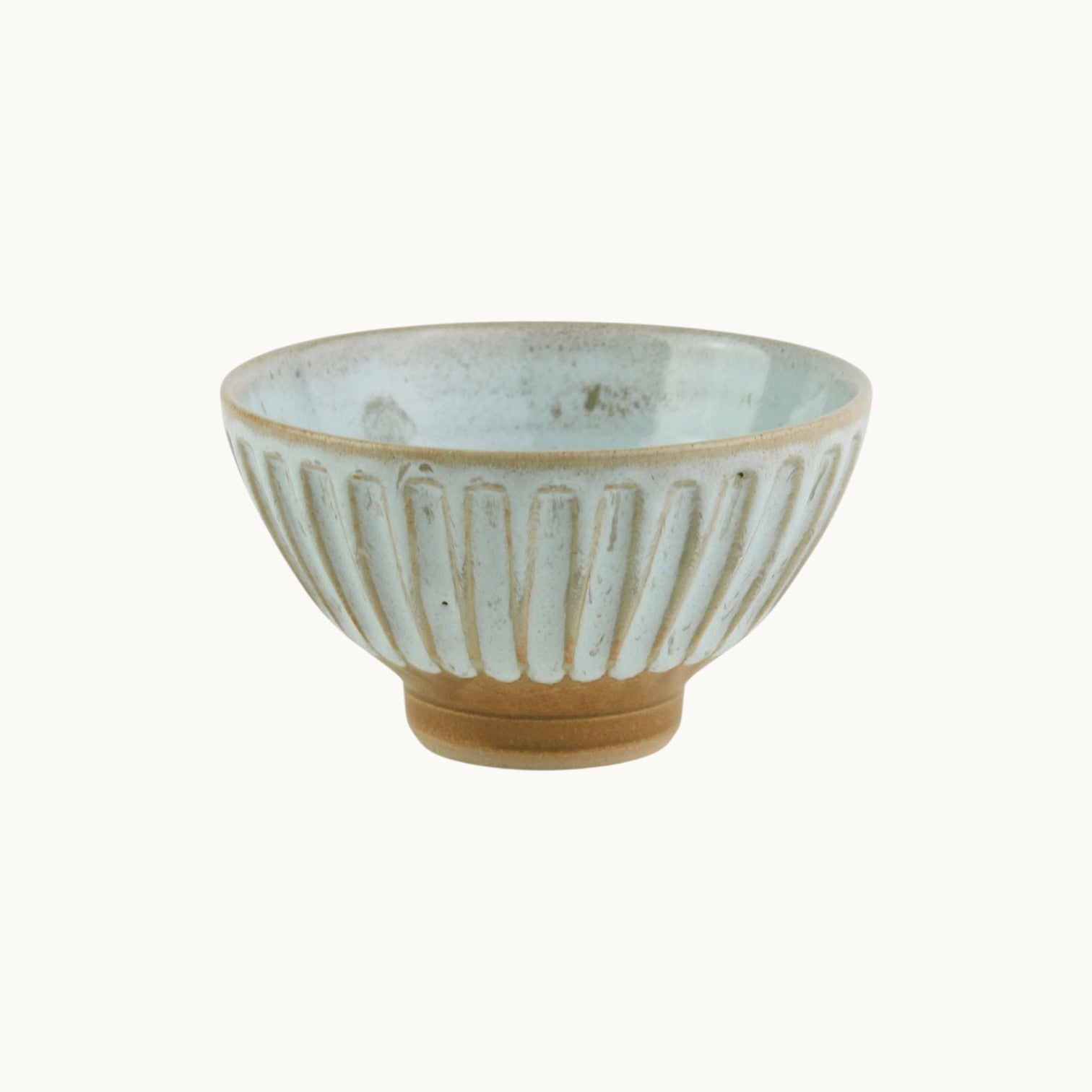 MANTRA LIVING hand-fluted ceramic bowl in desert oasis glaze with a wheel-thrown organic texture. #Color_Desert Oasis