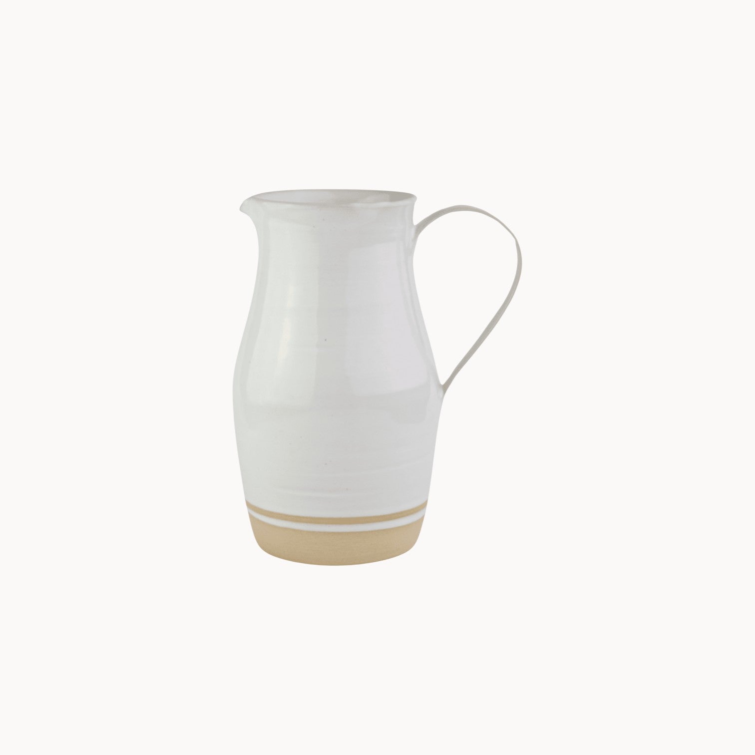 Mantra Living Milkstone Jug in the large size, handmade ceramic pitcher with a soft milky glaze and a raw unglazed base. #Size_Large