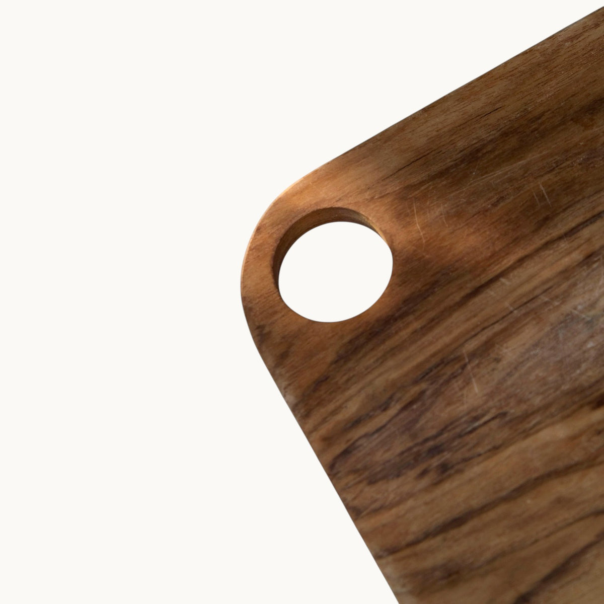 MANTRA LIVING wooden drinks board with a circular hanging hole, featuring natural wood grain texture.