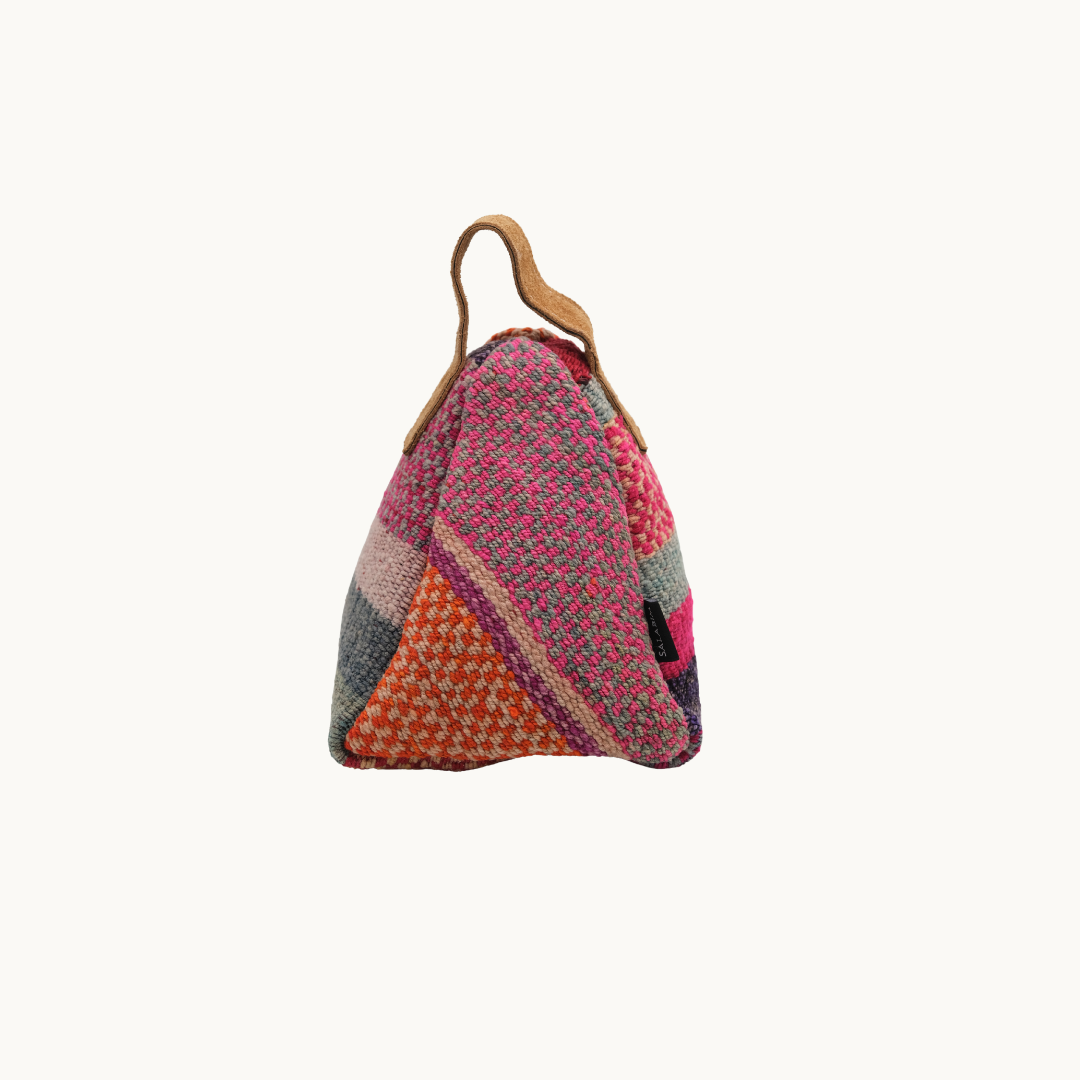 Ochre patchwork Salabim weighted door stop from the reverse, showing the pink and grey woven panels #color_Ochre Patchwork