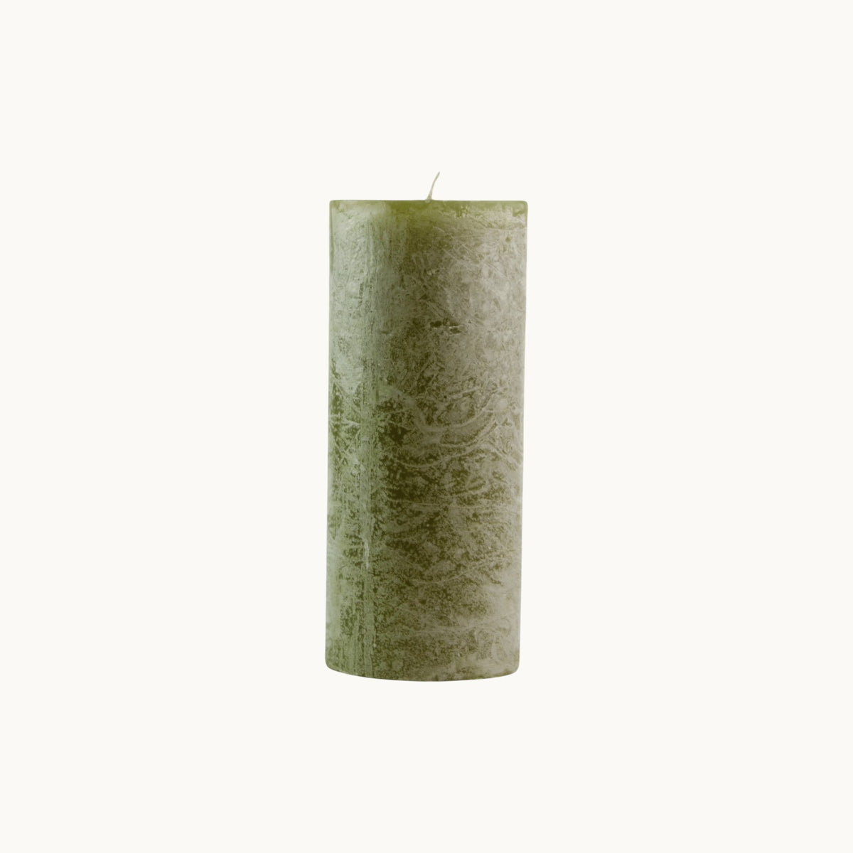 MANTRA LIVING olive green frosted pillar candle with a textured wax finish and cotton wick. #Color_Olive