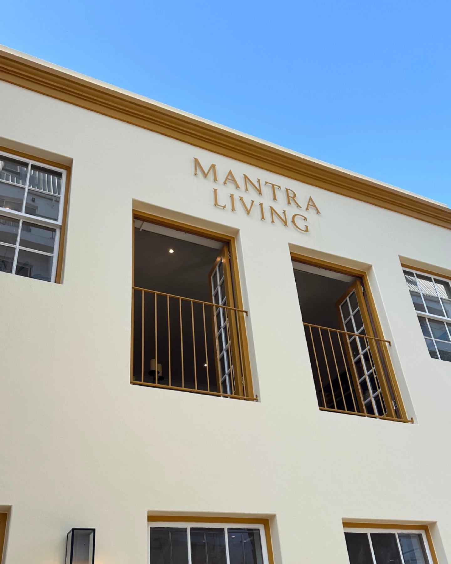 The Mantra Living name above the windows at 8 Watson Street